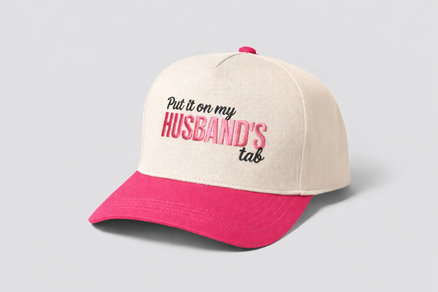 Put It on My Husband’s Tab Trucker Hat