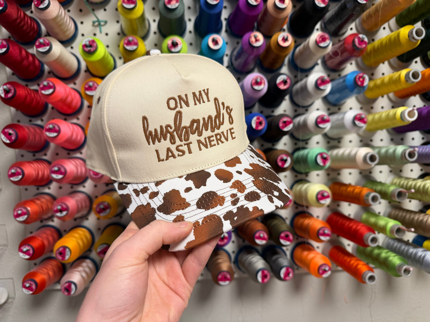 On My Husband’s Last Nerve Hat - Cow Print