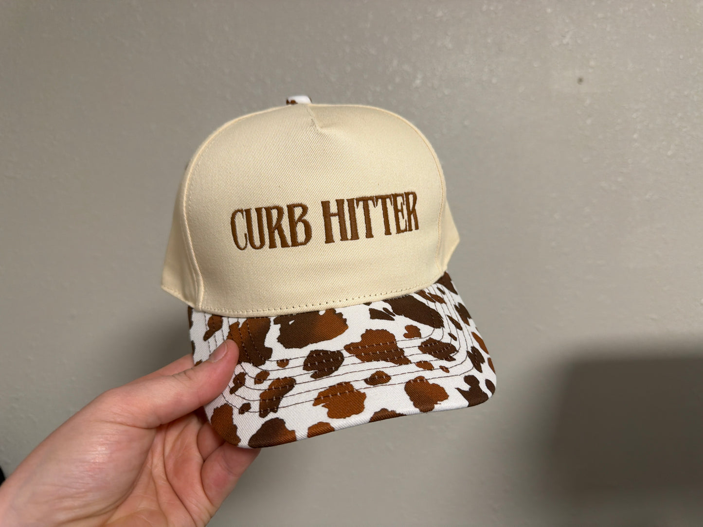 Curb Hitter cow Print Hat