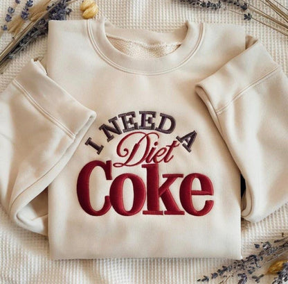 “I Need a Diet Coke” Embroidered Sweatshirt